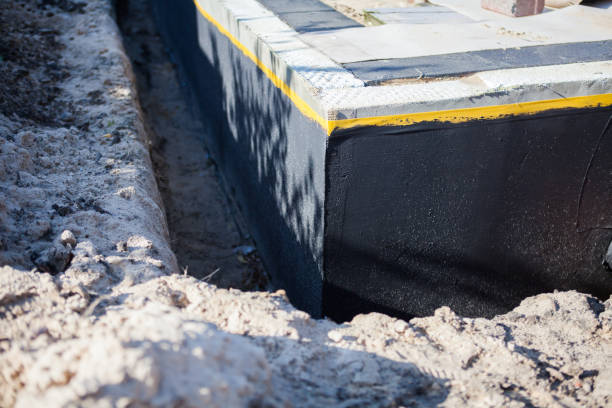 Professional Waterproofing technician working in Hamburg, NY